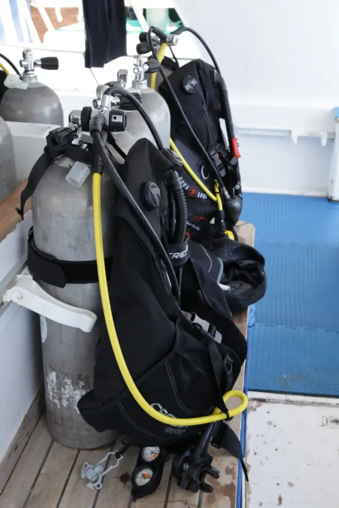 BCD and regulator mounted on a tank on the deck of a dive boat at Dahab, Egypt